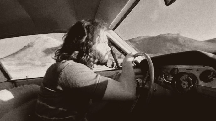 Jim Morrison driving.